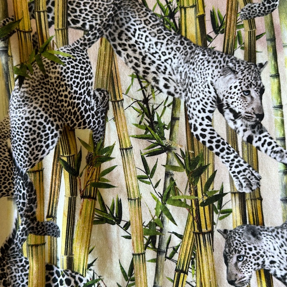 Leopard and bamboo print girls dress by Molo. Size 122-128.